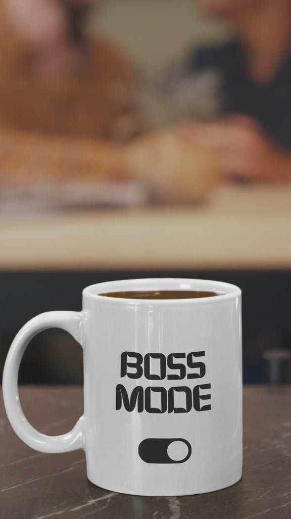 White ceramic mug with 'BOSS MODE' text and switch illustration, perfect for professionals and gifts.